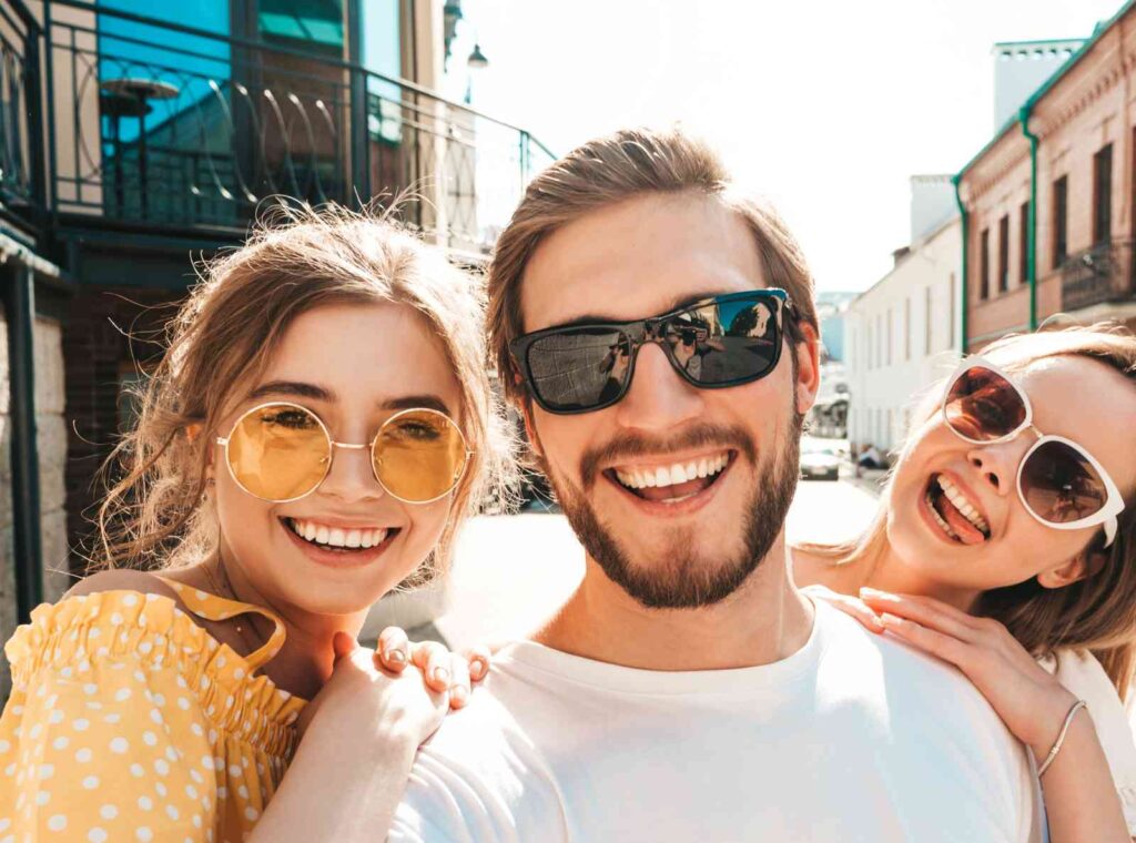 Three Friends smiling and spend a good time.